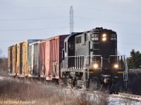  "The Penultimate Run".  In what was supposed to be the last day of Gio Rail operations North of Welland on the Canal Sub and Grantham Spur in St Catharines, turned out not to be. Upon gathering eight cars, 1859 did what MLW/Alco's love to do, sprung an oil leak. The train was tied down and after repairs the following day the last run did occur.
  It was not a great day for the railway or myself as earlier I had stopped at the dirt crossing at Hurricane Road to shoot this train and had slipped and fell on some snow covered ice. It was not until I got to Thorold that I realized my phone was missing. I backtracked to Hurricane Road and found my phone in an ice encrusted puddle. Amazingly it still worked albeit a bit glitchy and so I missed them crossing the CN at Glenridge. The hazards of this sport we call Railfanning.    
  Here we find the last Northbound on leap year day Feb 29th 2024 just past Allanburg with four cars for Clearwater Paper.  