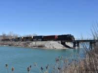  Nearing the end. On the last day of service on Gio Rail North of Welland we find RS-18 1859 crossing the Old Welland Canal with the final Southbound train on this section of track. The train is crossing a causeway and small bridge that was placed across the Canal as no more ships or Lake Freighters would ever pass this way again, and now it appears that this will now apply to trains.  