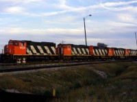 4 GP40-2's and a new HR412 bring an early 393 into Mac Yard. 393 was usually a Toronto bypass, with lots of newsprint from the northeast US and Quebec. It was also a prime user of MLW power, so this was also a little odd....but nice to see,