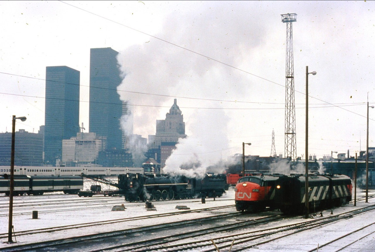 What five decades a picture can make! Here is CN 6218 ready for an excursion run up to Guelph sitting on one of  the Spadina ready tracks. It's amazing how the Toronto landscape has changed. Taken from my fathers collection