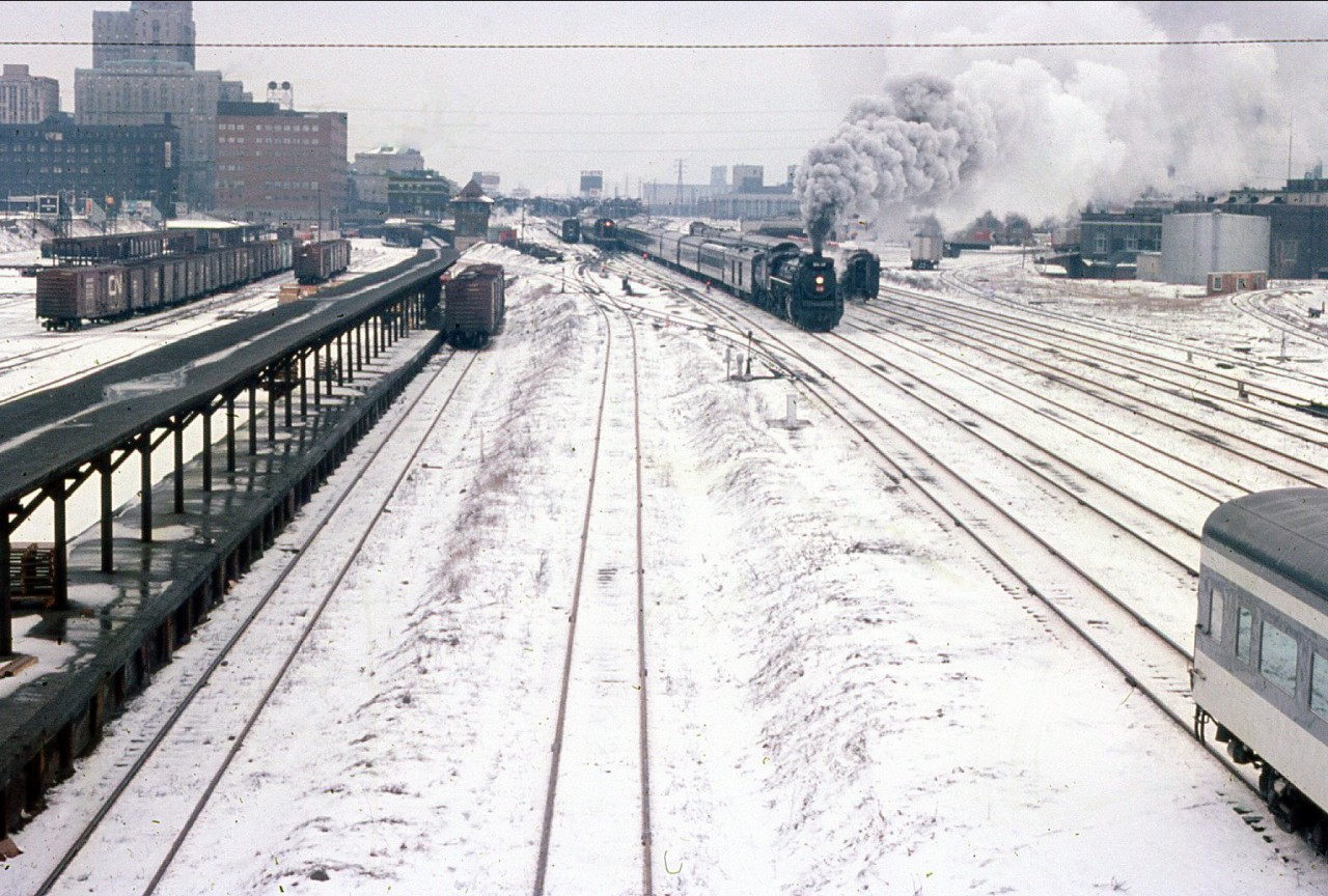 Spending most of the morning following the CNR 6218, here my father catches the train leaving Union station on it's way to the CNR Guelph sub for a day excursion. Taken from my fathers collection.