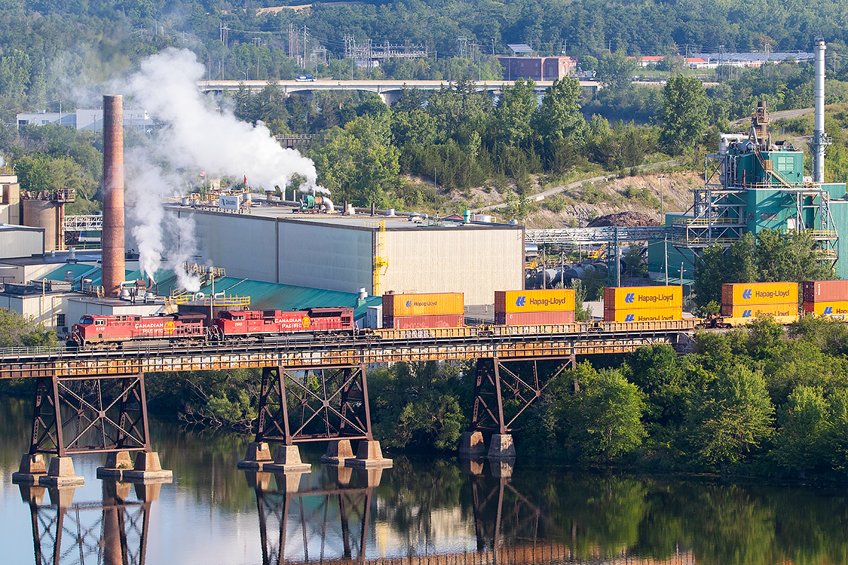 CP 8140 leads an early morning westbound train across the Trent River.