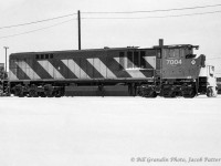 Bombardier HR-616 demonstrator 7004, one of four such units undergoing testing for the CP from February 1983 - May 1984, is seen on a snowy April day at Agincourt Yard.  Trailing behind the unit is CP 4742 and QNSL 209, while CP 5956 can be seen in the distance.  Only twenty of these units were ever built, all for CN, numberd 2100 - 2119.

<br><br>See more of these units testing on CP:
<a href=http://www.railpictures.ca/?attachment_id=15019>May 1983, Agincourt</a>
<a href=http://www.railpictures.ca/?attachment_id=15477>May 1983, North Bay</a>
<a href=http://www.railpictures.ca/?attachment_id=43538>May 1983, North Bay</a>
<a href=http://www.railpictures.ca/?attachment_id=50043>May 1983, Sturgeon Falls</a>
<a href=http://www.railpictures.ca/?attachment_id=14369>July 1983, Galt</a>
<a href=http://www.railpictures.ca/?attachment_id=43438>February 1984, Agincourt</a>
<a href=http://www.railpictures.ca/?attachment_id=22646>Winter 1983-1984, London</a>



<br><br><i>Bill Grandin Photo, Jacob Patterson Collection Negative.</i>