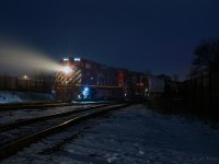CN L533 ties back onto its train after lifting a cut of cars out of XW20 at CN Guelph Junction Wellington.