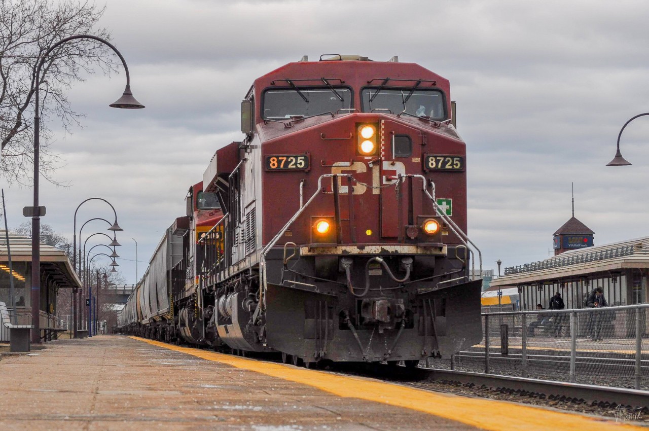 On February 28, 2024, CPKC 331 passes the EXO commuter station in Dorval, en route to Ontario.