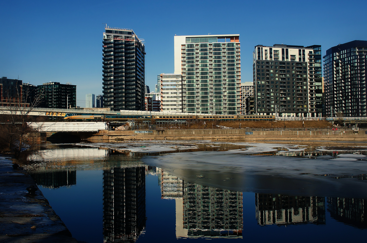 Non-wrapped VIA 901 leads VIA 63 past the Peel Basin.