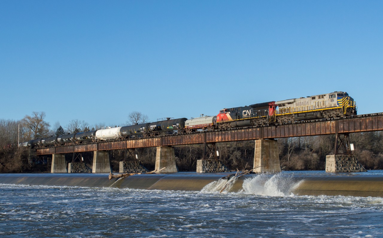 CN L501 crosses the Grand River in Caledonia with CN 3970 in the lead on a brisk but gorgeous March morning.  CN 3970 is the ex CREX 1512.  Knowing that L502 was late into Garnet yesterday, I decided to get up early and hope for a Northbound photo on the bridge in Caledonia.