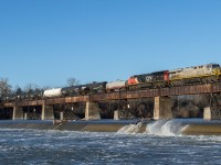 CN L501 crosses the Grand River in Caledonia with CN 3970 in the lead on a brisk but gorgeous March morning.  CN 3970 is the ex CREX 1512.  Knowing that L502 was late into Garnet yesterday, I decided to get up early and hope for a Northbound photo on the bridge in Caledonia.  