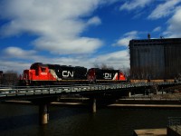 A pair of ex-UP units leads CN 500 into the Port of Montreal.