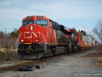 On a warm afternoon, X422 with CN ES44AC 3806 and CN ET44AC 3163 and 97 cars were lifted at Fort Erie on March 5/24.