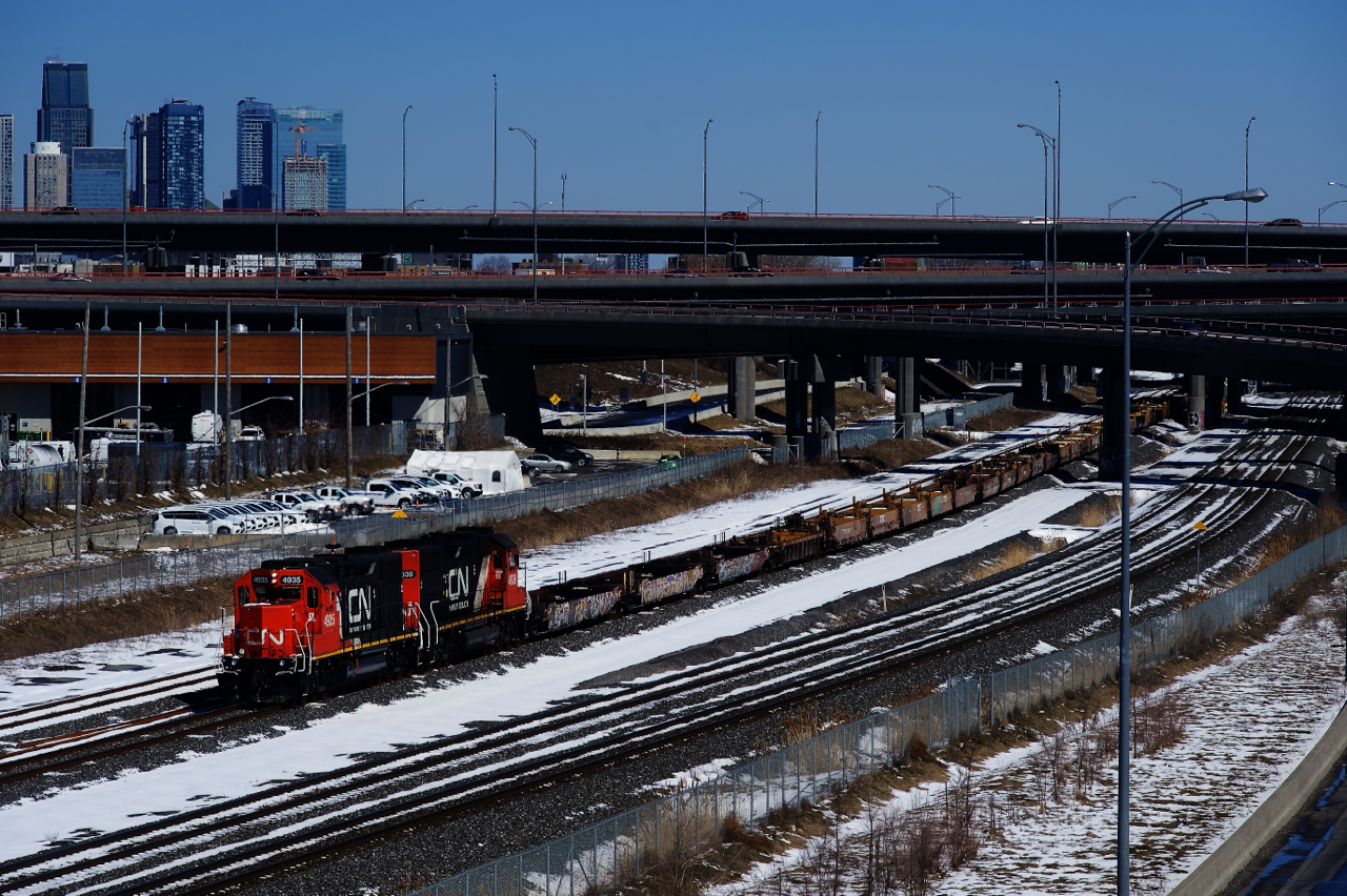 With the East End Horn switch not working (the east end of CN's Pointe St-Charles Yard), CN 500 has had to go to the main line to run around its train before going to the Port of Montreal. Soon the power will uncouple and run to the other end of these cars.