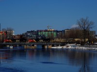 Empty potash train CN B731 has three GEs up front as it crosses the Lachine Canal.