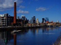 Empty potash train CN B731 has an ex-CREX unt on the tail end as it crosses the Lachine Canal.
