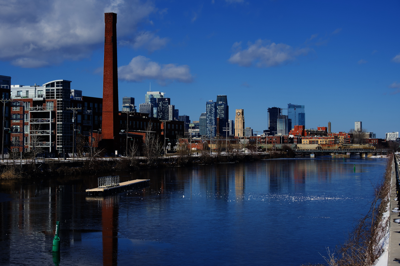 Empty potash train CN B731 has an ex-CREX unt on the tail end as it crosses the Lachine Canal.