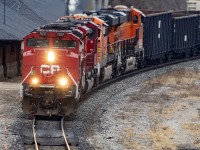 The "Twins", 7037 and 7030 have joyously been assigned to 238-239 for a few weeks; freedom from the sea of GEs and a real treat. Even more unique and colourful, on this day a pair of BNSF's GE's ar tagging along on the trip to Welland. Tomorrow, (the day 26th of feb that was), there would be 2 239's; the ACU's on the first, and the 2 BNSF's with a  raft of empty autoracks for Wolverton. An embarrassment of riches passing Galt Station.