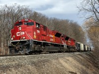 CP's power control, with whom I am usually highly frustrated, has granted Southern Ontario a gift. For the last couple of weeks, 2 of CP's 59 SD70ACU's have been assigned to trains 238-239 which once travelled London- Buffalo, but now flip in Welland. This shortcut has had 239 coming west in daylight as opposed to after dark; the nightmares of getting in and out of the US removed. 

So taking advantage of the chance to catch one of the 2 CP Strathcona units in motion, aided by 7037, 7030 attacks Orr's Lake Hill with a short fast train.