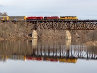 Continuing the trend of spectacular unique leaders, witness UP 3030 along with 8100 and 7046 shattering the calm crossing the Grand River in Cambridge under the watchful eyes of numerous Canada Geese. 