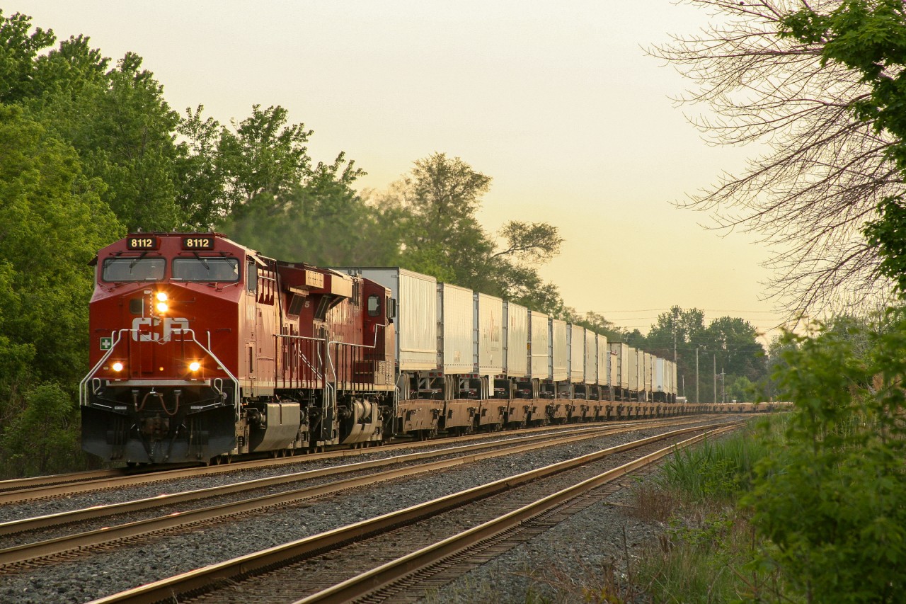 On May 28, 2018 CP’s Expressway service between Toronto (Hornby) and Montreal came to an end, after years of struggling to fill out the overnight service.  The Expressway concept started as a TOFC service between Toronto and Montreal, to compete with trucks in the 401 Corridor.  Initially named the Iron Highway and rebranded as “Expressway”, the concept was never fully embraced by customers, often leading to mostly empty trains running back and forth.  At its height, the service operated with morning and evening departures from both terminals and even expanded service to Windsor/Detroit to compete truckers with the entire 401 corridor.  Over the years traffic waned and the trains were reduced to one evening departure, 6 days a week between Toronto and Montreal. As with many things on the railroad that we take for granted, it seems like it was “here today and gone tomorrow.” 

Like many last runs, it was an unceremonious event, with the train departing as advertised, headlong into the afternoon GO Rush.  Riding off into the setting sun and into the history books.  

CP 132-28: CP 8112, CP 8835 - 100 platforms