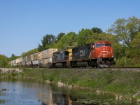 CN Q 11441 21 highballs through Sparrow Lake with CN 5778 and GECX 7733. 