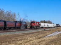 CPKC 242-18 eases into the siding at Netook for a meet with the 2816 which was making another break in run up to Edmonton. 