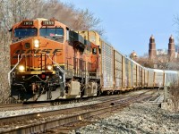 With the clocks changing this weekend I figured I better try this angle as the lighting will be a bit harsher at this time next week when 137 typically passes. It has been nice having more BNSF power around lately even if it’s mainly GE’s. Here 137 storms westward after crossing the Credit River in Streetsville. 