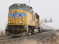 I finally managed to catch one of the new VIA Seimens set on delivery and honestly I was more excited about the UP SD70M leader, LOL! Nevertheless it was neat seeing one fresh off the assembly floor. I know in service these will get boring fast. Unfortunately the skies decided to open up with a blizzard just before the train arrived.