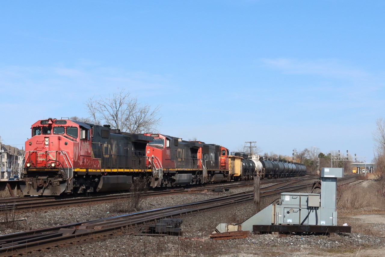 With a tired looking leader CN 2516, A435 makes the transition from the Halton Sub. to the Oakville Sub. at Burlington West. The SCD (snow clearing device) in the foreground hasn't seen much use this winter.