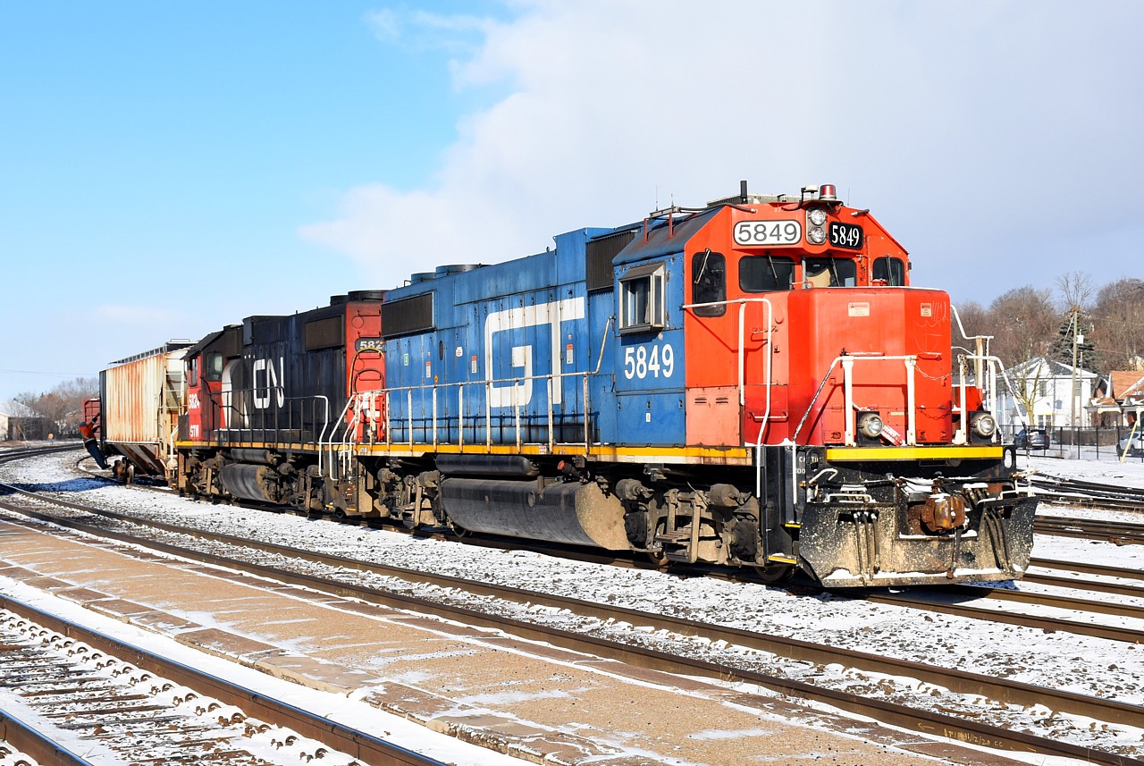 A pair of GTW GP38-2s assigned to CN 580 likely won't attract as much attention as BNSF 2098 did last year, but considering blue GT units have rarely been assigned to Brantford, GTW 5849 is a-ok in my books. My meeting downtown couldn't have ended at a better time. 580's crew was making their last switching move assembling their train for Cainsville before taking a break in the office to warm up. It was a frigid morning, and as you can see by the cloud bank looming to the west, the sun didn't last too much longer. It's a beautiful thing when it all comes together.