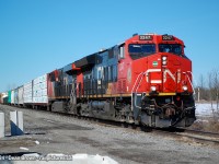 I caught CN 531 with CN ET44AC 3247 and CN ES44AC 3811 at Netherby Rd. on the CN Stamford Sub on a sunny afternoon as the snow melted away from our last Snow.