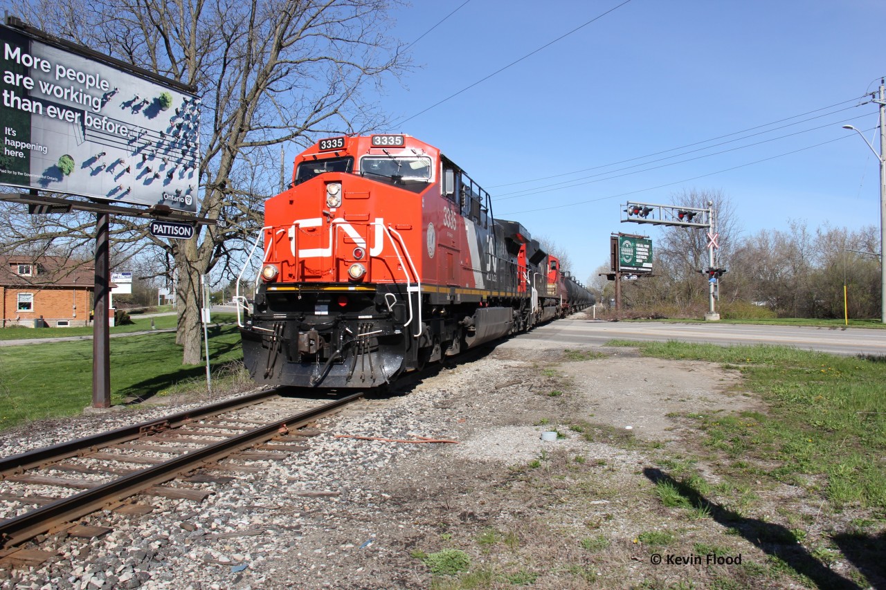 CN 502 is pictured beginning its journey across the Hagersville Sub crossing Colborne St. E. in Cainsville. Power was rebuilt CN 3335 and CN 8102. Anyone know what 3335 was rebuilt from? Apparently, the OSR F units were around at this time as well. What seemed like a quiet day for trains, was apparently quite fruitful.