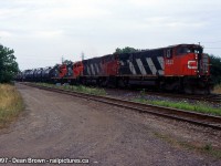 Back in the days when Niagara Falls Yard was still active and locals as 569 headed up Clifton and onto the wye for Port Robinson in July 1997. 