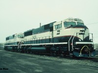 In 1993, Burlington Northern had placed a record setting 350-unit order with GMDD in London, Ontario for 4,000 horsepower SD70MAC’s totalling $675 million. In December 1993, the first one, BN 9400 rolled-off the assembly line at the London plant with 349 more to follow over the course of the next couple years. Painted in the BN “Executive Scheme” the units departed London for delivery to BN in Chicago via both CN and Canadian Pacific. Here BN 9429 and 9430 are viewed at CN’s yard in London waiting to be lifted after having made the short trip from the GMDD plant.