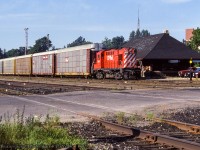 CP RS18u 1855 is stopped at the Woodstock station, preparing to depart with racks for CAMI Automotive at Ingersoll.<br><br><i>D. Beauregard Photo, Jacob Patterson Collection Slide.</i>