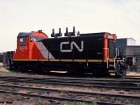 During a spring morning, CN SW1200RS 1374 is viewed waiting for its next assignment at CN’s Stuart Street yard’s small shop in Hamilton, Ontario. The unit was repainted in the CNNA scheme the year prior. It was eventually retired on April 6, 1999, and would later become CN CS-03.