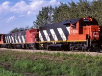 A unit train of sulphur had just come from the Lac La Biche sub with a few loads of lumber on the head end and some loaded grain boxes on the tail end. 30+ hoppers of golden yellow nuggets made up the middle portion of the train. A very typical use of those beetles, with it facing the right direction for a photo. The 4602 is at the rear of this ABA consist. Unusual having a unit train bringing lumber cars home, the Muskeg Mixed generally handled those cars.