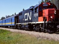 For me at the time, this felt like a great day. A GP38 still in the original noodle scheme and a full sized consist of passenger equipment. With an ex-NAR cab on the tail end. Terrific stuff. For those interested, starting with the lead car, baggage's 7855 and 7856, coaches 4977 and 5099, Cab 79101 at the end. Photo taken at mile 24.4 at lunchtime.