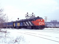  The makeover from CN to VIA on the old cab units was a really interesting time for the fans. The very thought of just what might be seen had me out as often as running away from work would allow. Of course nowhere near as often as I would have liked.
  A nice example of what could be seen is this image taken on a cold day in February 1979. Unfortunately I have misplaced my notes so not sure of the exact date. CN 6785 and VIA 6761 sure looked good as photographed coming off the CN Oakville sub onto the CN Dundas Sub at Bayview Junction, a most popular railfan location between Burlington and Hamilton. I don't believe either of these units have survived over the years.