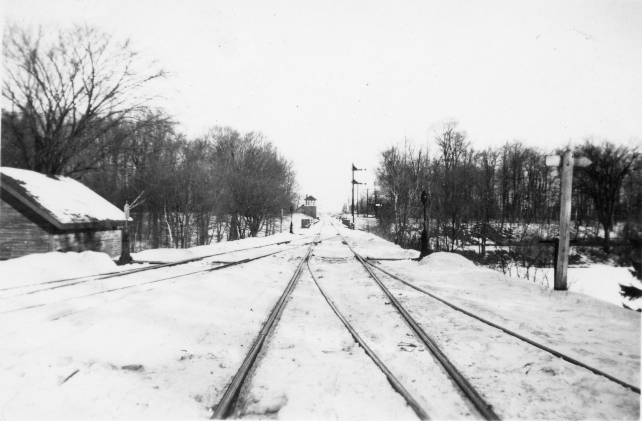 CN Milton Sub., CPR Interlocking  
Viewed from the CNR Milton station at Mile 13.9 Milton Subdivision, the semaphore signal displays a Stop Indication for northward CNR movements at the CPR Interlocking located at Mile 14.2 Milton Subdivision.