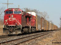 A year ago, on the last day of official Canadian Pacific operations prior to the merger with KCS, CP 137 is viewed waiting patiently at Orrs Lake on the Galt Subdivision for a meet with H88. 
