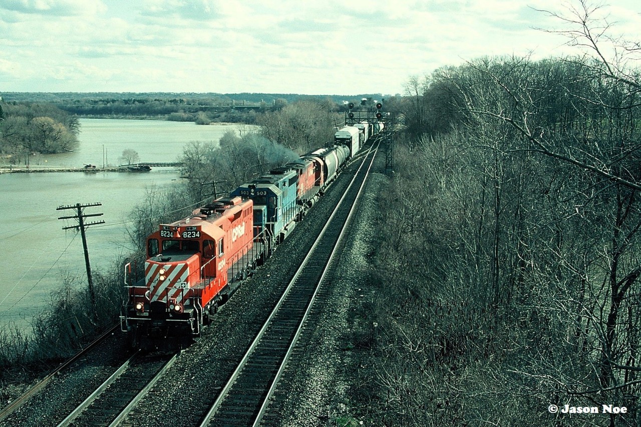 CP B523 is viewed heading east through Bayview Junction after departing Aberdeen Yard in Hamilton for Toronto. The train was powered by GP9u 8234, HATX GP40-2 505 and CP C-424 4212. Leased HATX 505 was originally built in December 1977 as Boston & Maine Railroad 305.