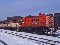 I'm not sure of the reason for this..but on a nice clear morning in March 1972, I found CP RS3 8439 accompanied by TH&B GP7s 77, 73, and 75 at the TH&B's Chatham Street roundhouse. While RS3s where commonly used on the Goderich sub train in the mid-late 1970s, pairs of SW1200RS units were more common in the early 1970s and this would be an odd way to pick up or leave a unit at the roundhouse. Perhaps a delayed Kinnear?