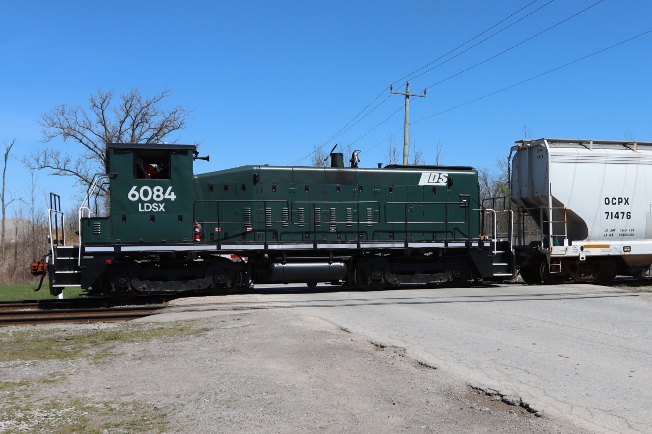 LDSX 6084 is occupying Thorold Townline Road while performing switching duties at the OXYVinyls Canada plant on the outskirts of Niagara Falls. The dark green paint scheme is a nice change for that of sister unit LDSX 6089.

http://www.railpictures.ca/?attachment_id=51484