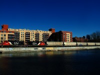 CN 500 has six grain empties from Ardent Mills as it heads west along the Lachine Canal. Decades ago, CN and CP served dozens of clients along the canal, but Ardent Mills is the last rail-served client left.