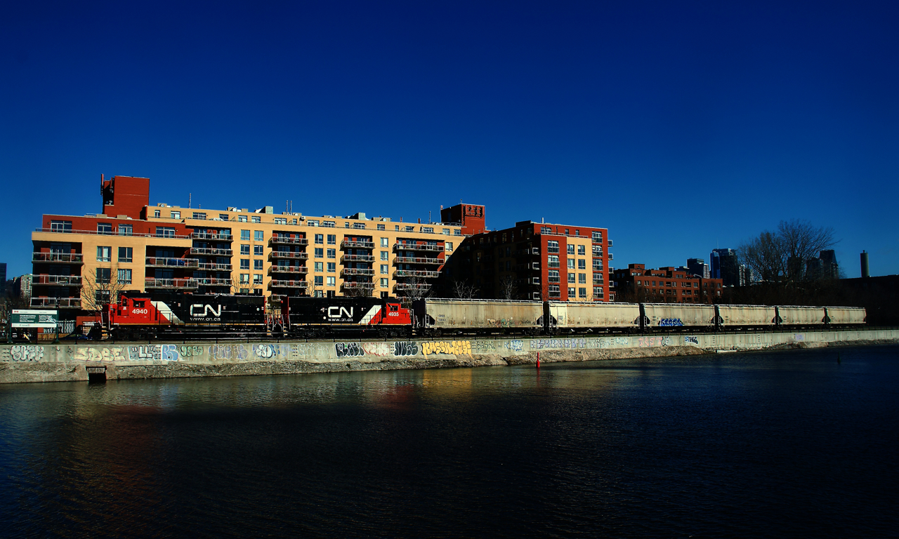 CN 500 has six grain empties from Ardent Mills as it heads west along the Lachine Canal. Decades ago, CN and CP served dozens of clients along the canal, but Ardent Mills is the last rail-served client left.