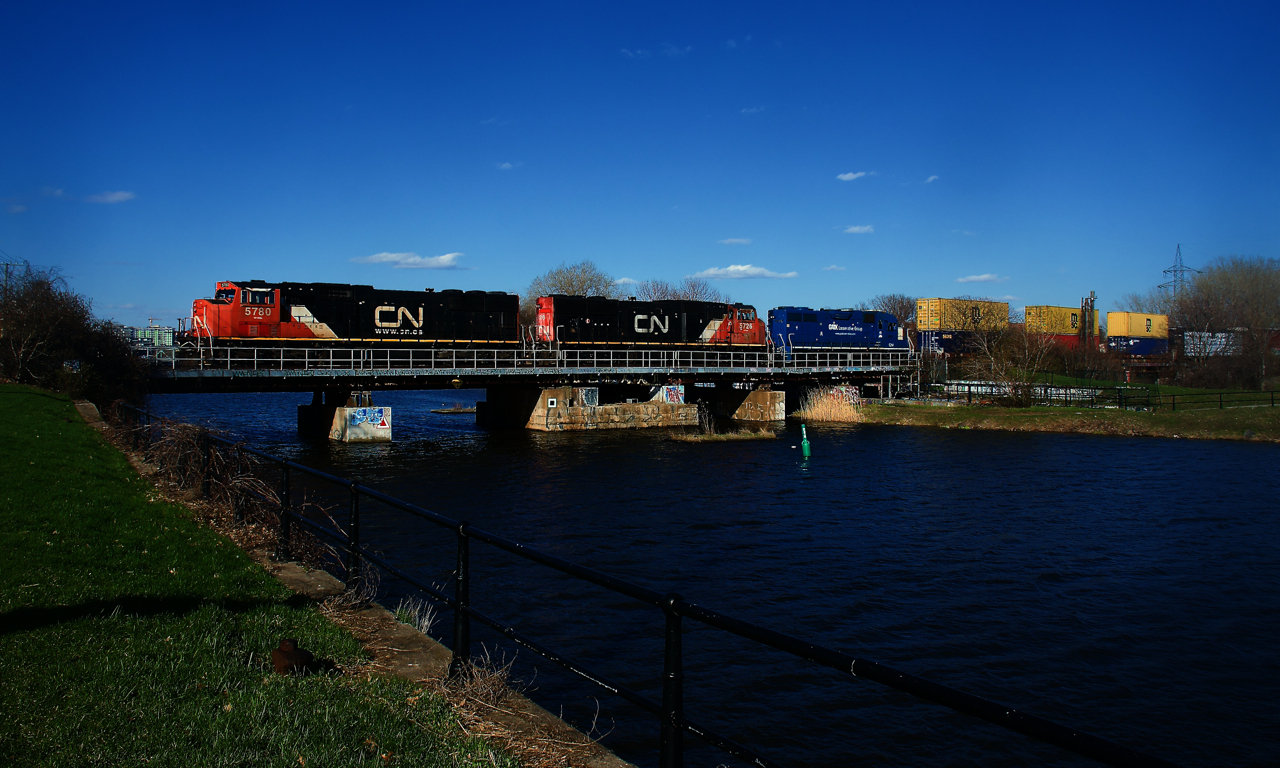 CN 401 has a pair of SD75Is and an ex-GMTX GP38-2 (CN 5780, CN 5726 & CN 4904) as it crosses the Lachine Canal.