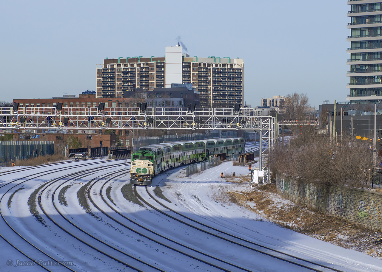 With their four hour commute almost done, GO 3710 from London rounds the curve at Queen Street, just a few miles from its destination of Toronto Union Station.