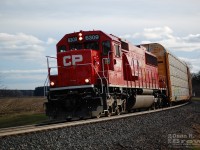 CP Eastbound local with CP SD60-3 6309 and two autoracks head east from Woodstock to Wolverton on March 31/24. 