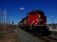 Loaded with grain for Albany, CPKC 328 is passing Du Canal Station with CP 7041 & NS 9828 up front.