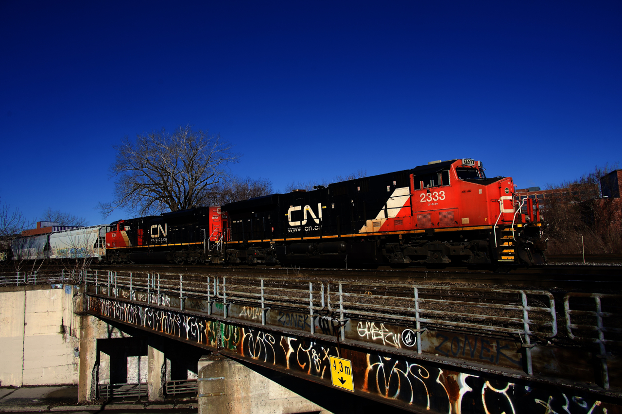 CN 324 crossing over Wellington Street with CN 2333, CN 8001 & 76 cars.