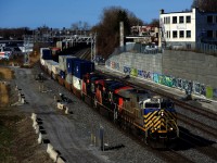 CN 2781 (ex-CREX 1315) is leading CN 120 as it approaches Turcot Ouest on the South Track.